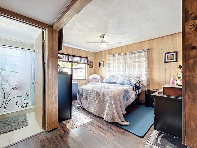 3788 N Econlockhatchee Trl, Orlando, FL 32817 - bedroom featuring wood walls, wood finished floors, and a ceiling fan