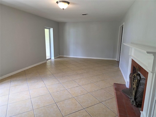 1695 E Horatio Ave, Maitland, FL 32751 - unfurnished living room featuring light tile patterned flooring, a brick fireplace, and baseboards
