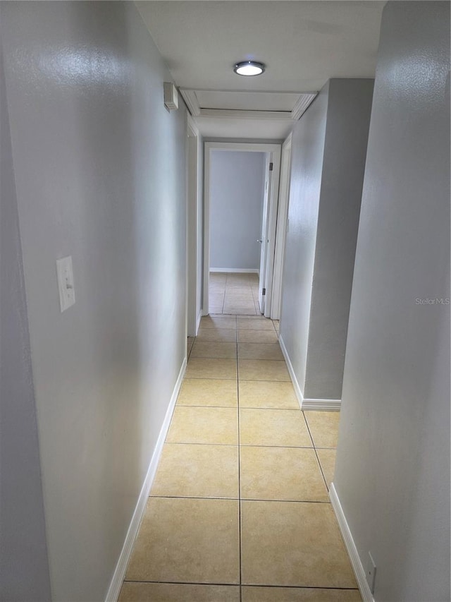 1695 E Horatio Ave, Maitland, FL 32751 - corridor with light tile patterned floors and baseboards