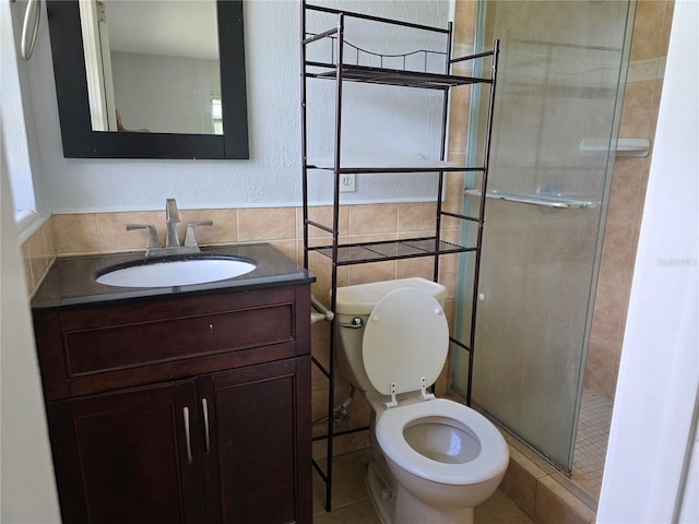 1695 E Horatio Ave, Maitland, FL 32751 - full bath with tile walls, a stall shower, toilet, and vanity