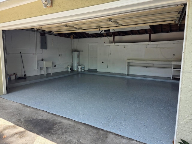 1695 E Horatio Ave, Maitland, FL 32751 - garage with electric panel, a sink, and water heater