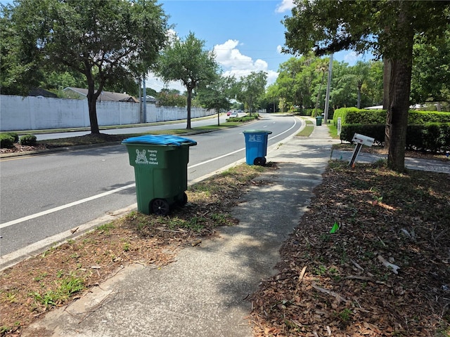 1695 E Horatio Ave, Maitland, FL 32751 - view of asphalt street with sidewalks and curbs