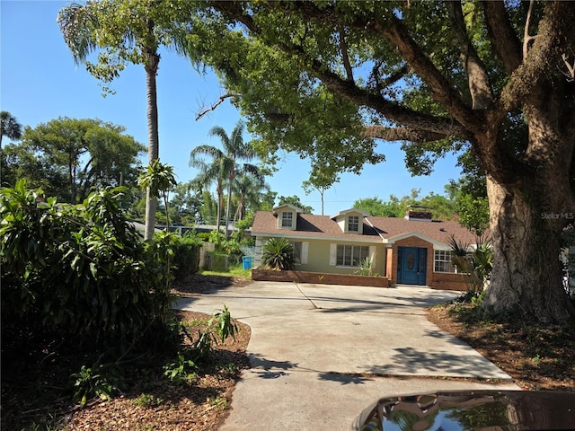 1695 E Horatio Ave, Maitland, FL 32751 - view of front of house featuring concrete driveway