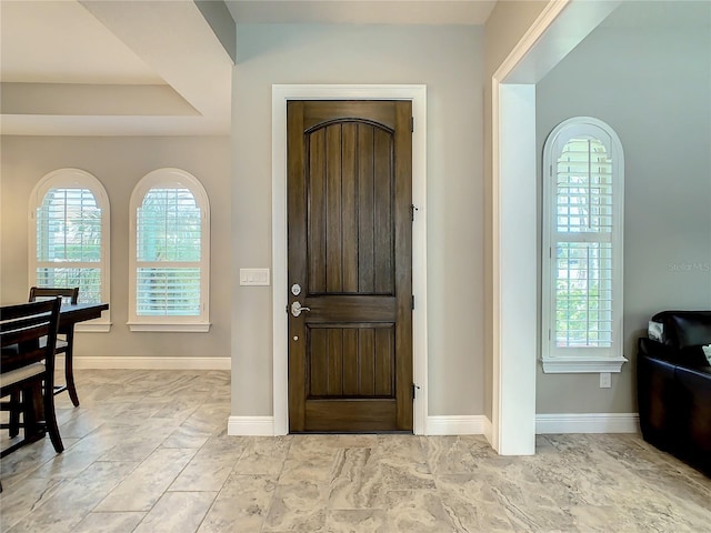 8491 Pippen Dr, Orlando, FL 32836 - entryway featuring plenty of natural light and baseboards