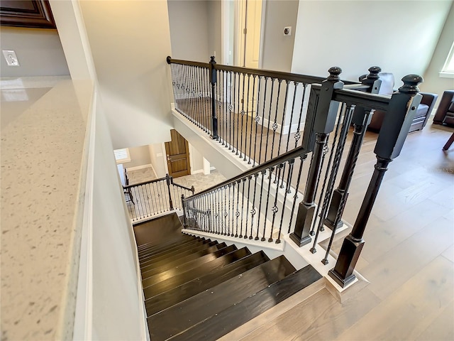 8491 Pippen Dr, Orlando, FL 32836 - staircase with wood finished floors