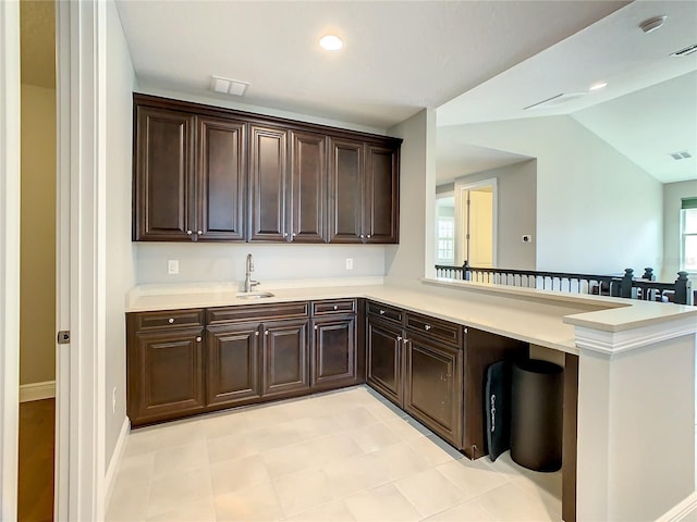 8491 Pippen Dr, Orlando, FL 32836 - bar area featuring a sink, vaulted ceiling, and recessed lighting