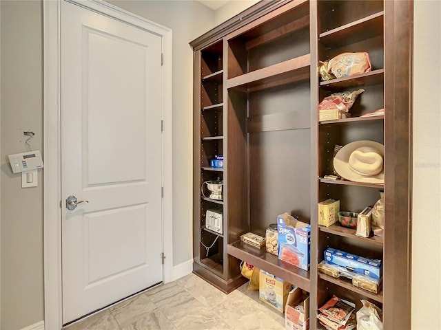 8491 Pippen Dr, Orlando, FL 32836 - mudroom with light marble finish floors and baseboards
