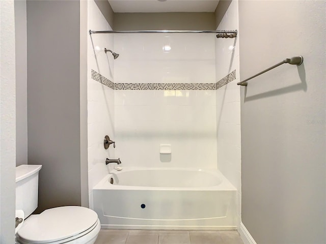 8491 Pippen Dr, Orlando, FL 32836 - bathroom with tile patterned floors, toilet, and bathing tub / shower combination