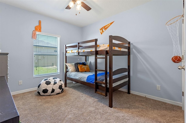 bedroom with carpet floors, baseboards, and ceiling fan