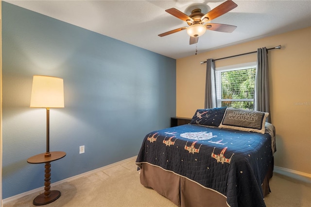 bedroom featuring carpet, baseboards, and ceiling fan