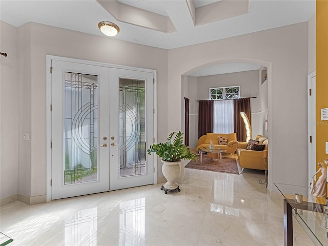 8333 Via Verona, Orlando, FL 32836 - foyer entrance with arched walkways, french doors, and light marble finish floors