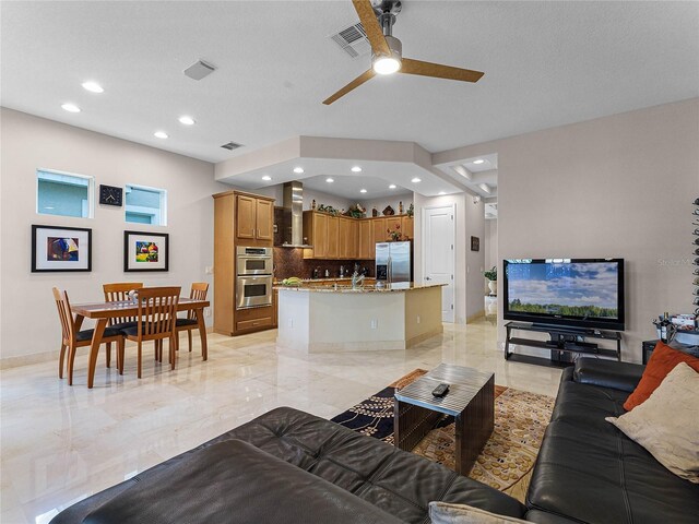 8333 Via Verona, Orlando, FL 32836 - living area featuring recessed lighting, ceiling fan, and baseboards