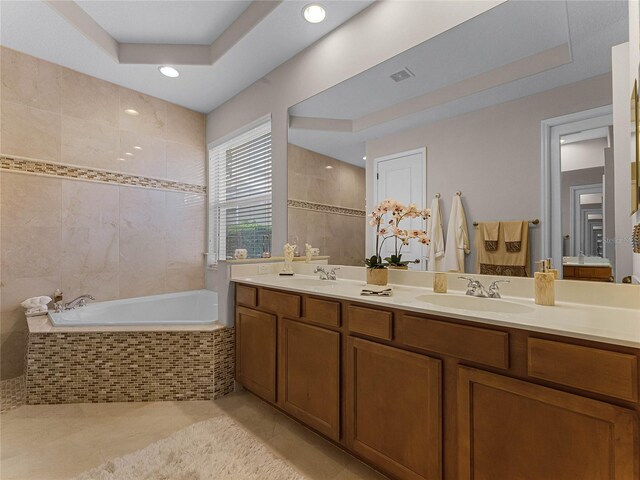 8333 Via Verona, Orlando, FL 32836 - bathroom featuring a bath, double vanity, and recessed lighting