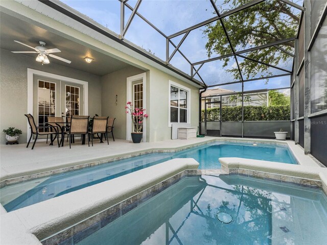 8333 Via Verona, Orlando, FL 32836 - view of pool with a patio, a pool with connected hot tub, ceiling fan, glass enclosure, and french doors