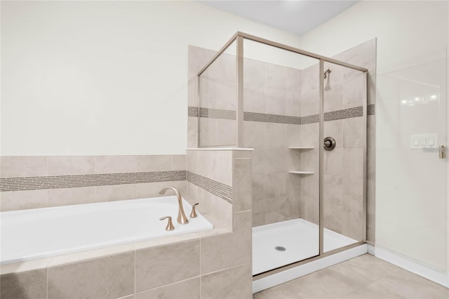 11258 Whistling Pine Way, Orlando, FL 32832 - bathroom featuring a shower stall and a bath