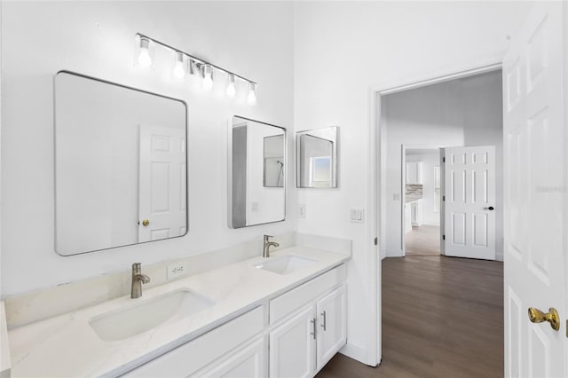 3078 Mandolin Dr, Kissimmee, FL 34744 - bathroom featuring wood finished floors and double vanity