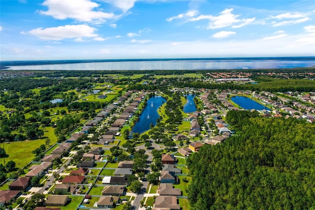 3078 Mandolin Dr, Kissimmee, FL 34744 - aerial perspective of suburban area featuring a nearby body of water