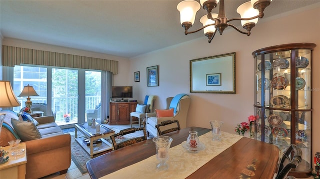 717 S Beach St Unit 205C, Daytona Beach, FL 32114 - living room featuring a chandelier