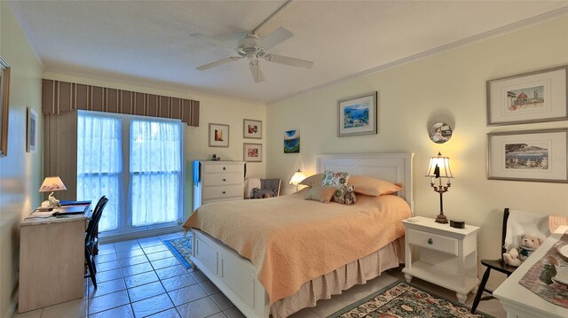 717 S Beach St Unit 205C, Daytona Beach, FL 32114 - tiled bedroom with a ceiling fan and ornamental molding