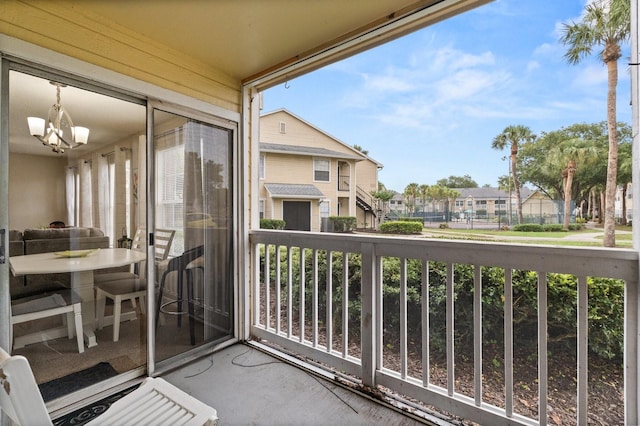 balcony featuring a residential view
