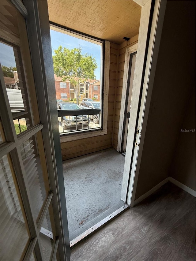 5540 Devonbriar Way Unit 103, Orlando, FL 32822 - doorway to outside with plenty of natural light and wood finished floors