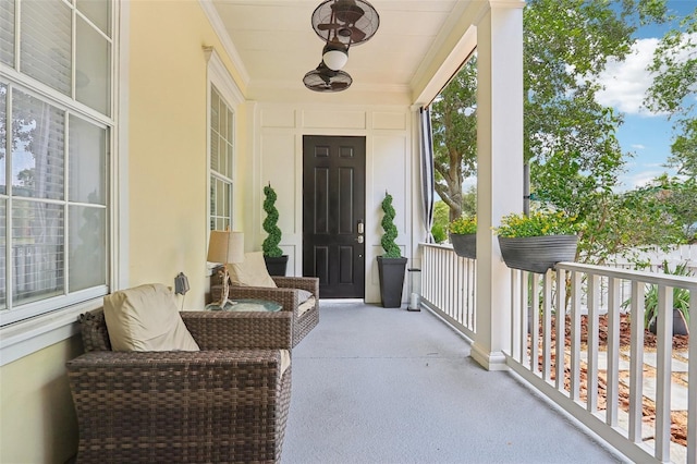 entrance to property featuring covered porch