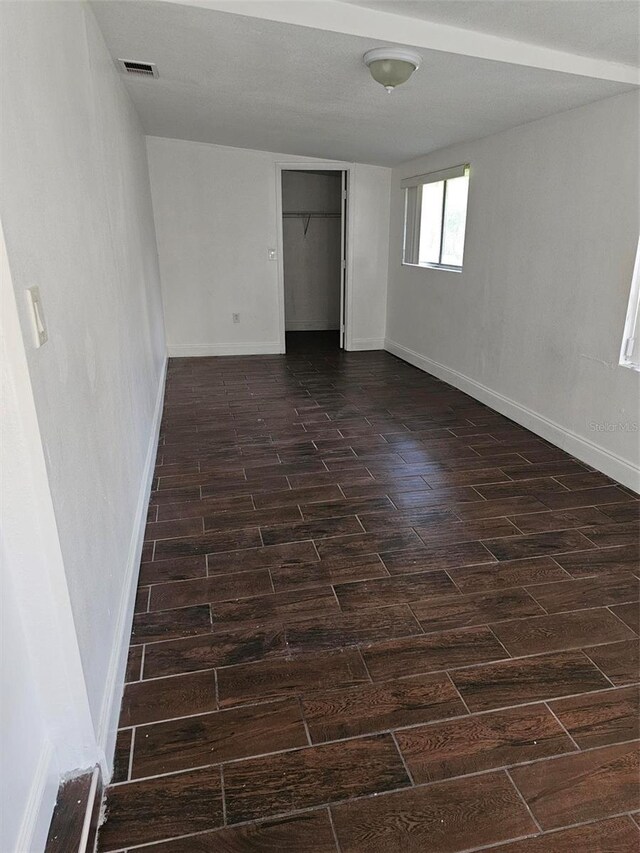 4061 Kirkland Blvd, Orlando, FL 32811 - empty room featuring wood tiled floors and baseboards