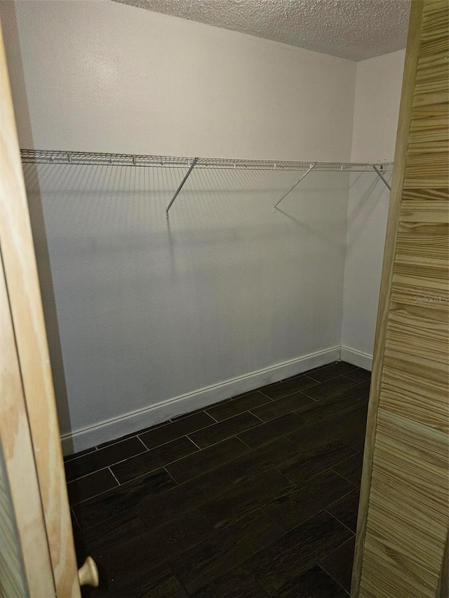 4061 Kirkland Blvd, Orlando, FL 32811 - walk in closet with wood finish floors