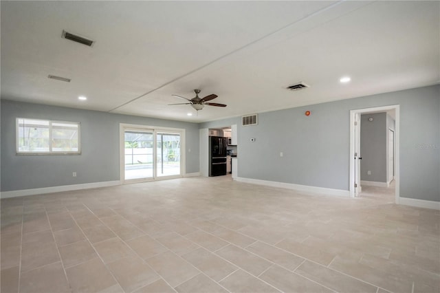 4651 Helena St NE, Saint Petersburg, FL 33703 - unfurnished living room featuring recessed lighting, ceiling fan, and baseboards