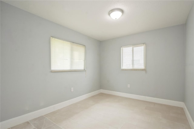 4651 Helena St NE, Saint Petersburg, FL 33703 - spare room with baseboards