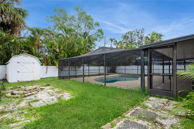 4651 Helena St NE, Saint Petersburg, FL 33703 - view of yard with a storage shed, an outbuilding, and glass enclosure
