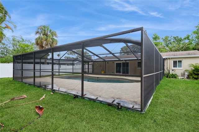 4651 Helena St NE, Saint Petersburg, FL 33703 - view of swimming pool with a patio area and glass enclosure