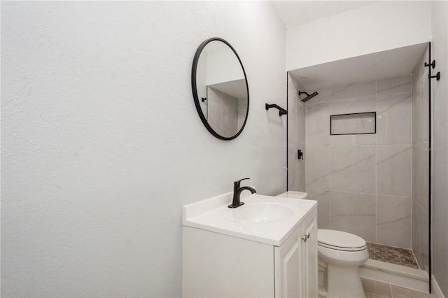 4651 Helena St NE, Saint Petersburg, FL 33703 - full bathroom with toilet, a shower stall, vanity, and tile patterned flooring
