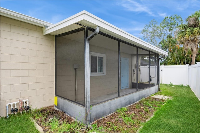 4651 Helena St NE, Saint Petersburg, FL 33703 - view of side of property featuring a sunroom