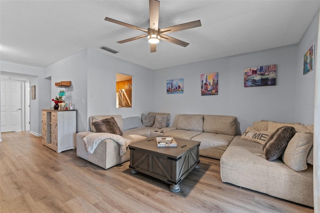 758 E Michigan St Unit 208, Orlando, FL 32806 - living area featuring light wood-style flooring and a ceiling fan