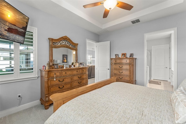 carpeted bedroom with baseboards and ceiling fan