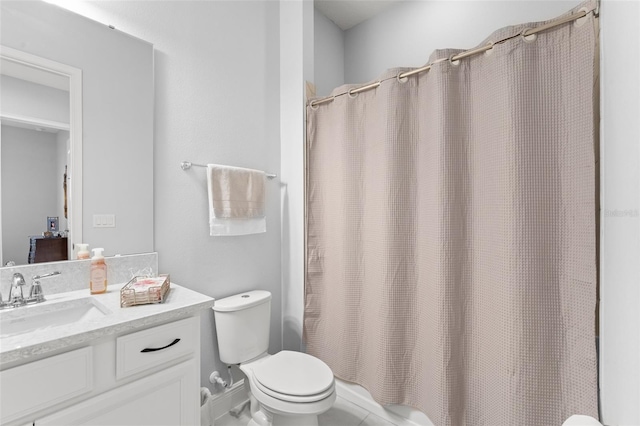 bathroom with toilet, vanity, and shower / bathtub combination with curtain