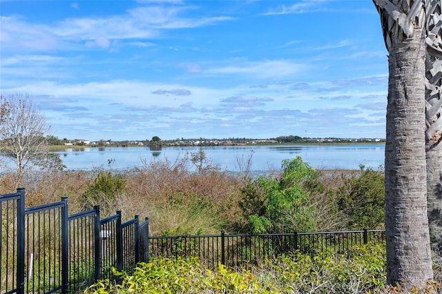 water view featuring fence