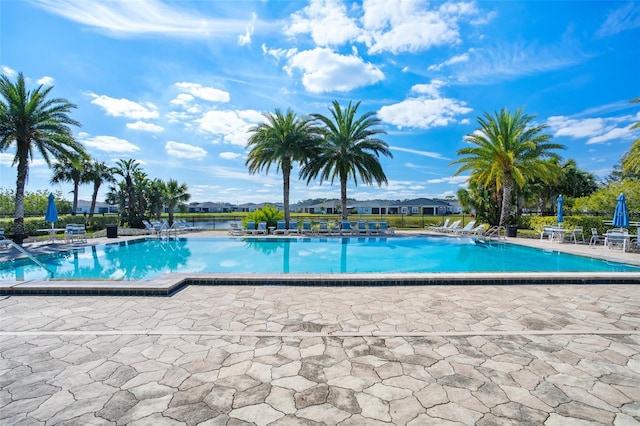 community pool featuring a patio area