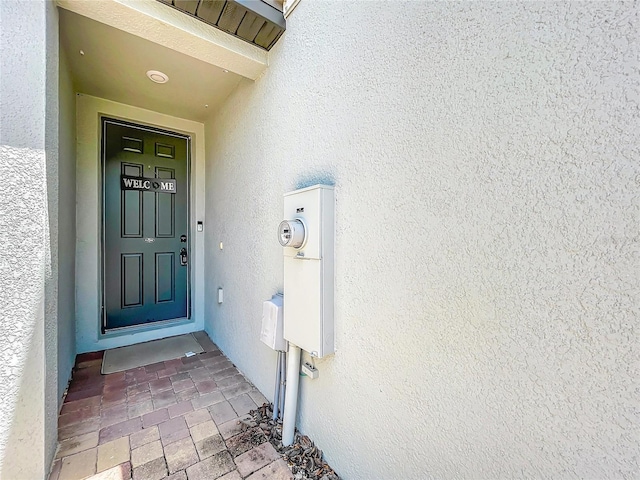 1045 Desert Candle Dr, Ocoee, FL 34761 - doorway to property with stucco siding