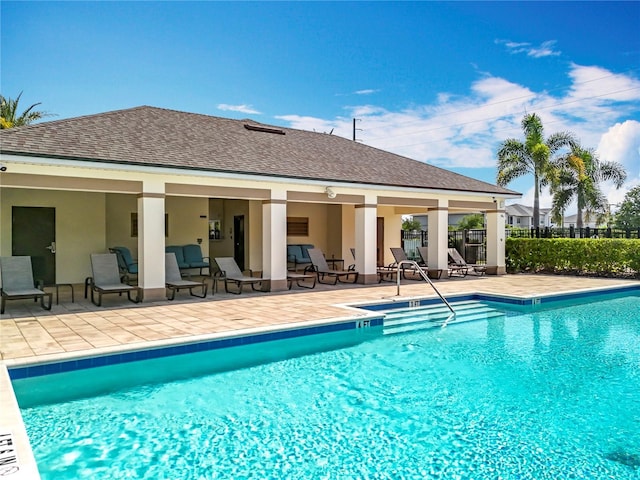 1045 Desert Candle Dr, Ocoee, FL 34761 - community pool featuring a patio