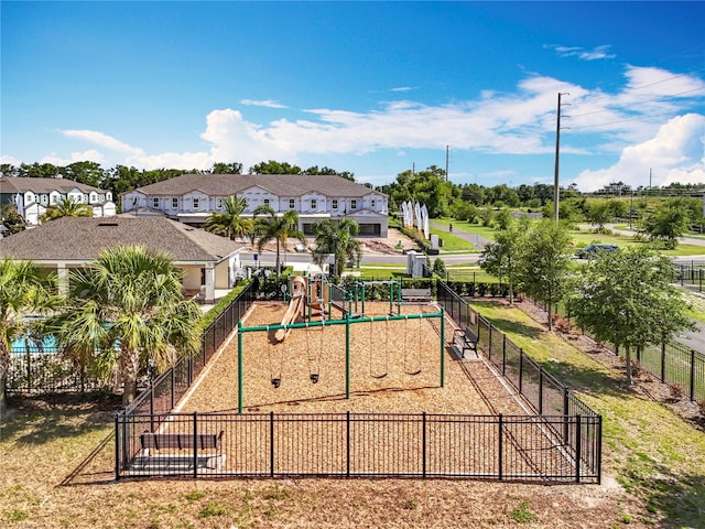 1045 Desert Candle Dr, Ocoee, FL 34761 - communal playground featuring a residential view