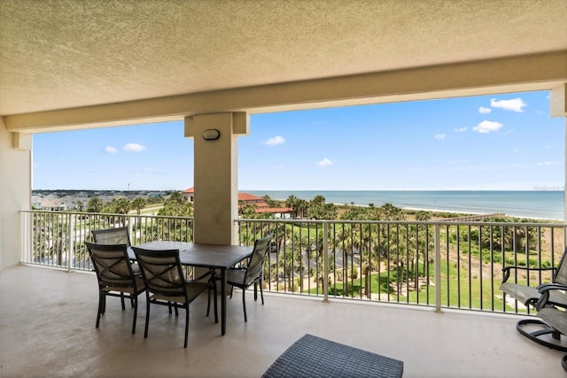 balcony featuring a water view