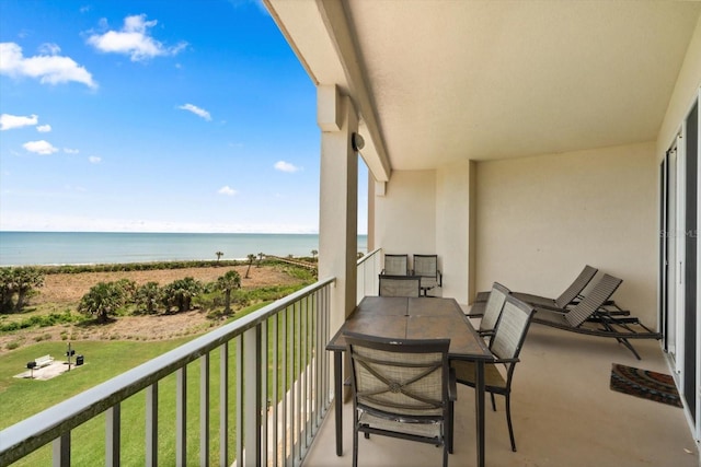 balcony featuring a water view