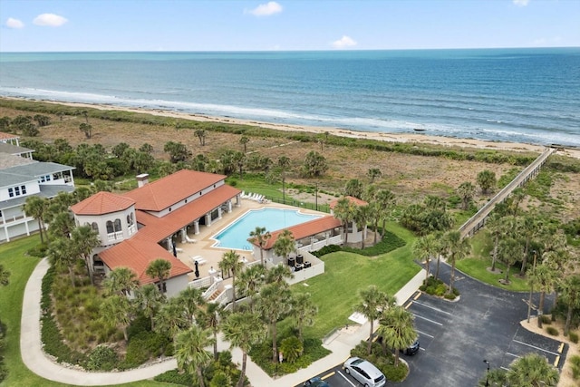 bird's eye view of unending shoreline and a pool area