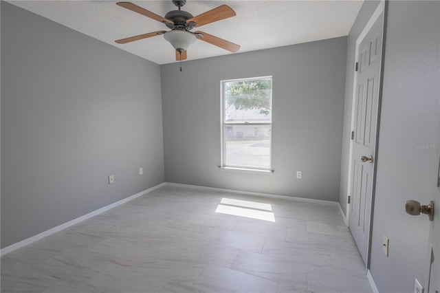 3216 White Blossom Ln, Clermont, FL 34711 - spare room with ceiling fan and a textured ceiling