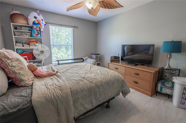 3216 White Blossom Ln, Clermont, FL 34711 - bedroom with a ceiling fan, light marble finish flooring, and a textured ceiling