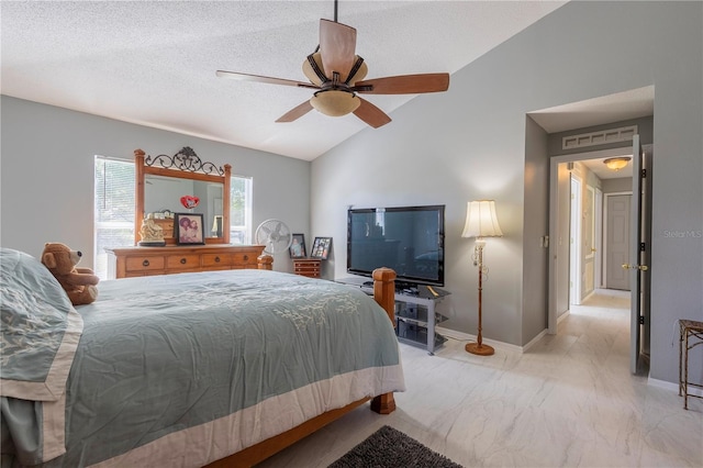 3216 White Blossom Ln, Clermont, FL 34711 - bedroom with lofted ceiling, light marble finish floors, ceiling fan, and a textured ceiling