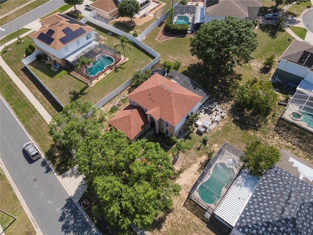 3216 White Blossom Ln, Clermont, FL 34711 - aerial perspective of suburban area with a pool area