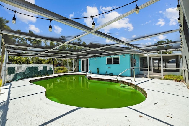 2302 16th St W, Palmetto, FL 34221 - view of pool featuring a patio area and a lanai